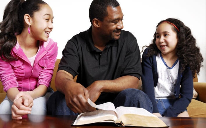 Father and daughters