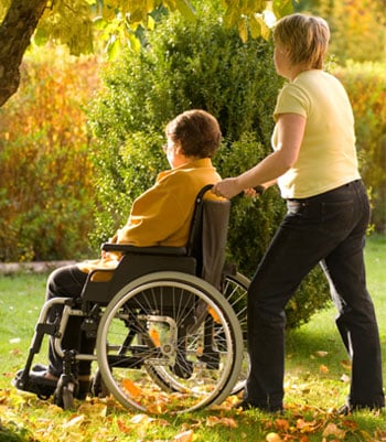 Helping push a wheelchair